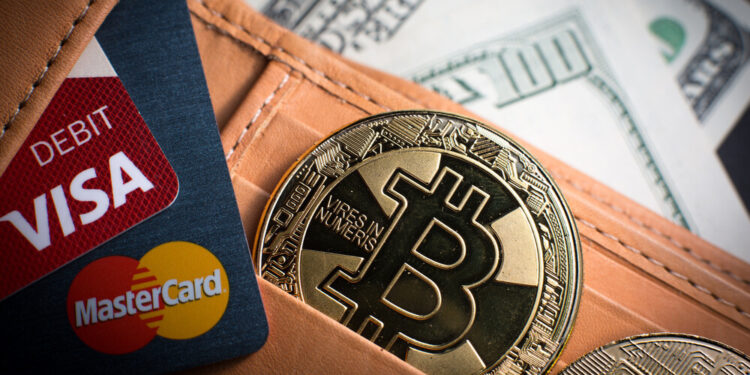 Debit cards, Bitcoin and dollar bills