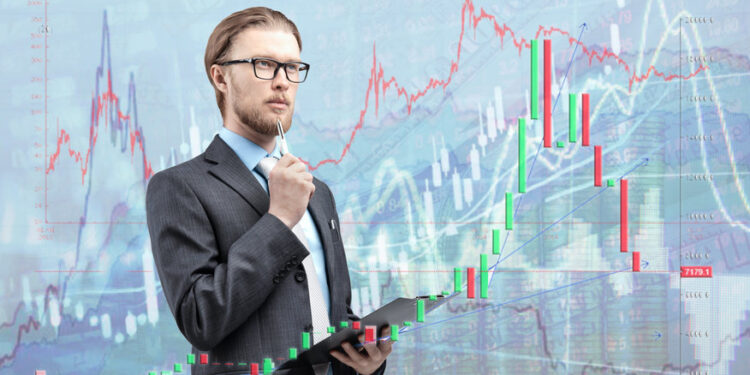 businessman trader analyst in glasses spectacles with notebook and thinking, on diagram background. Trading on stock exchange concept