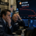 BTC dips below $80k.